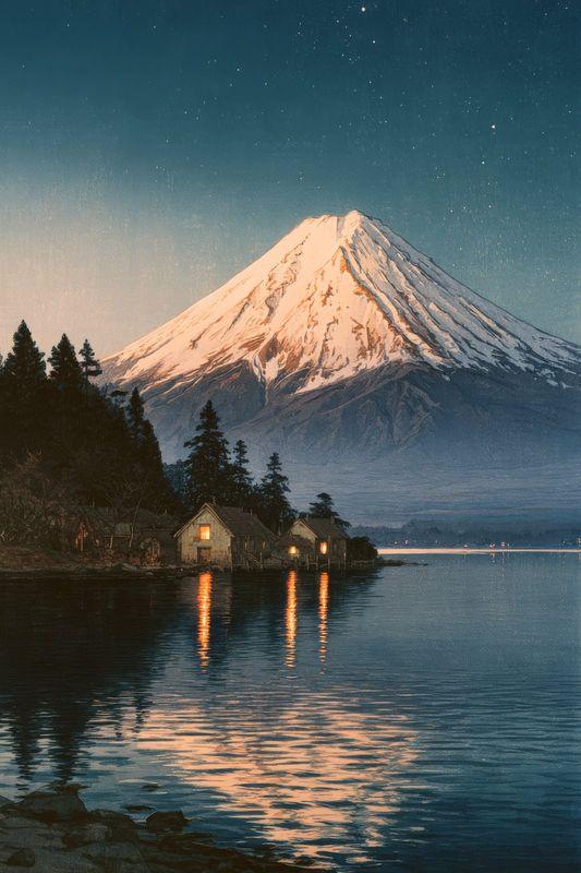 Mount Fuji at dusk reflected in a still lake, with lantern lights in lakeside houses